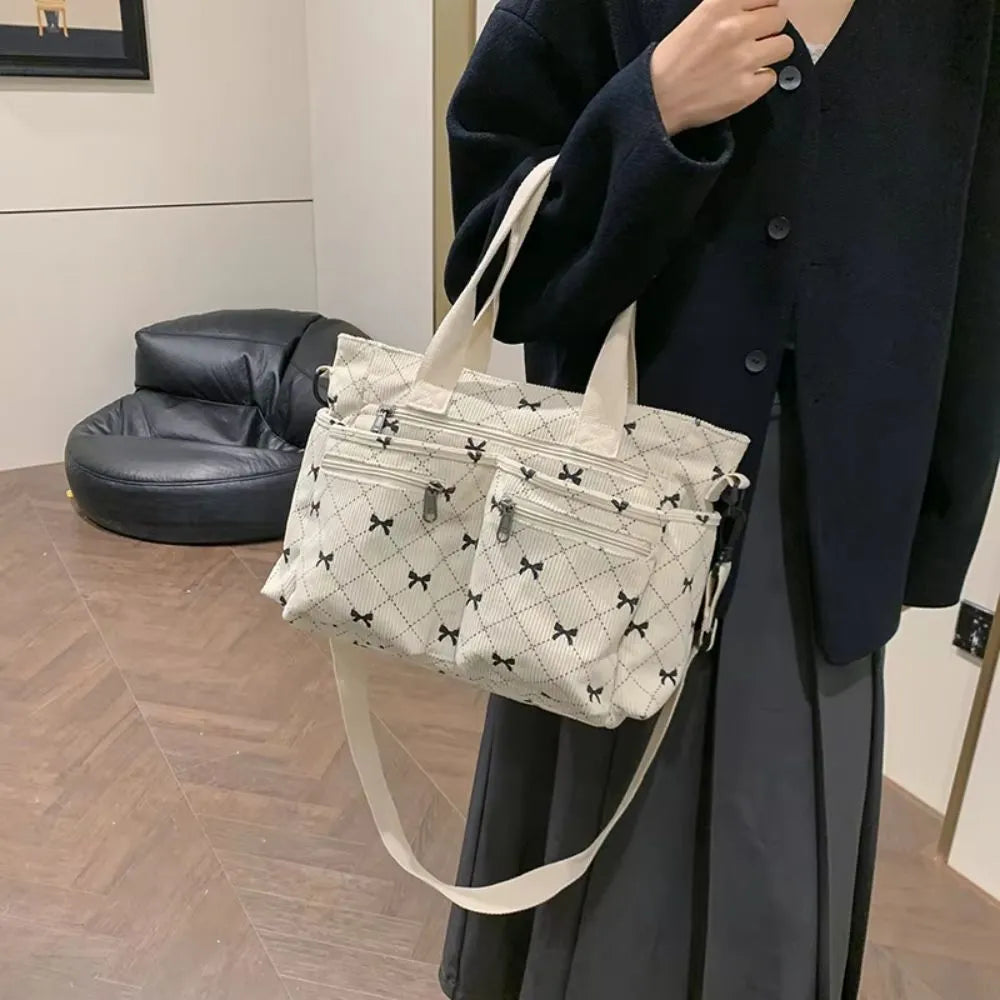 Vienne torba tote ze sztruksu z kokardowym wzorem